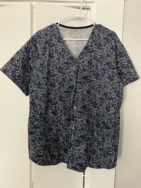 Woman’s Navy Floral Pattern Button Down V-Neck Scrub Top